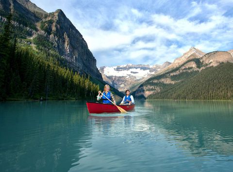 alberta fairmont chateau lake louise hotel canoeing couple