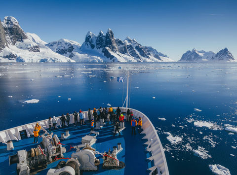 antarctic peninsula bow of ship cruising through tranquil channels qe