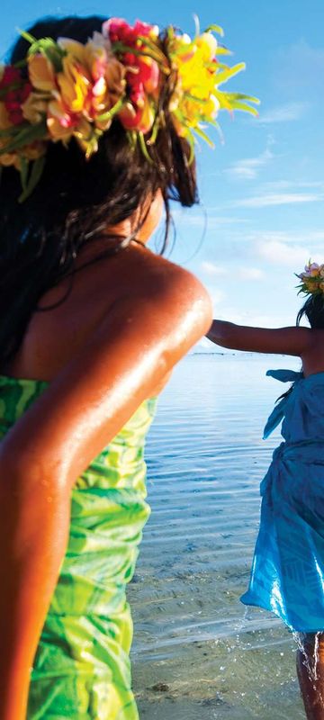 cook islands locals celebrating in shallows cit