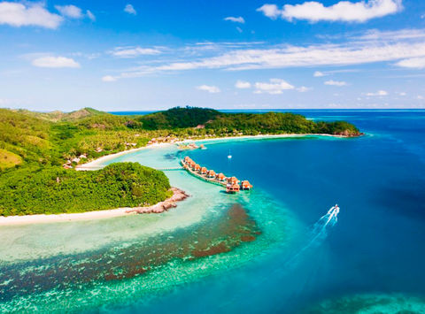 fiji likuliku island resort aerial view overwater bures lir