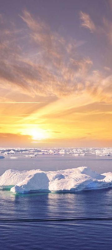 greenland disko bay sunset over ice floes near ilulissat istk