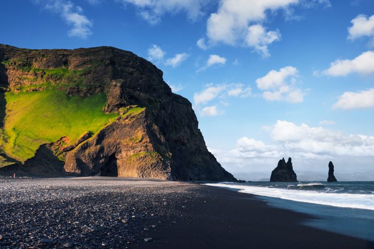 iceland south west reynisfjara beach lone figure istk