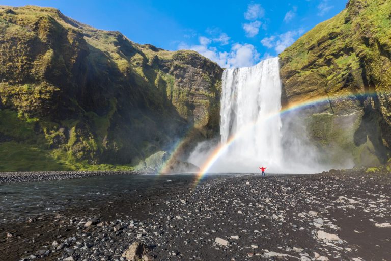 iceland south west skogafoss tiny figure istk