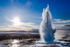 iceland strokkur geyser erupts in winter astk