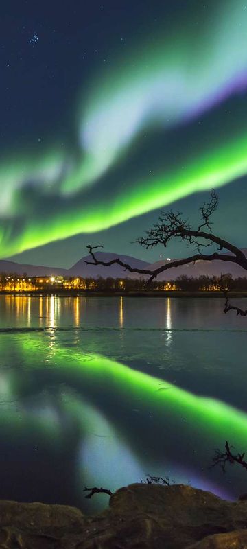 northern norway aurora over lake prestvannet tromso istk