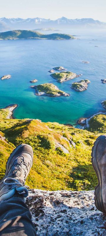 northern norway hikers resting at viewpoint senja istk