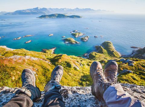 northern norway hikers resting at viewpoint senja istk