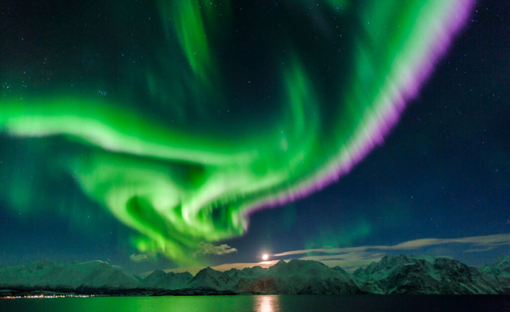 northern norway lyngenfjord northern lights over mountains vl