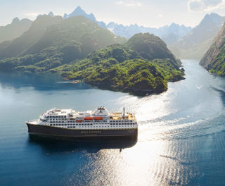 norway coastal cruise havila castor in trollfjorden by mariusbeckdahle