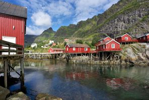 norway lofoten red stilted houses at reine ap