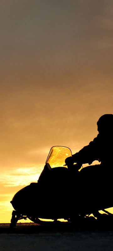 norway sunset snowmobiling istk