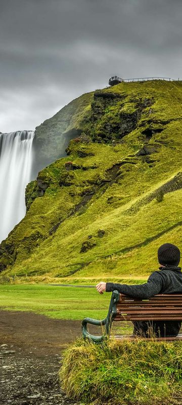 south iceland taking in the view at skogafoss istk