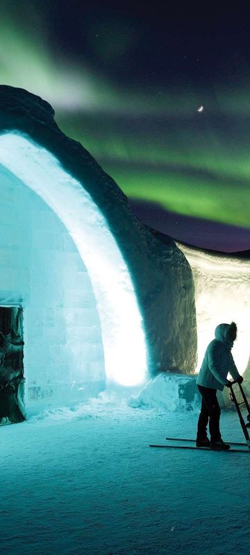 northern lights over the icehotel in Swedish Lapland