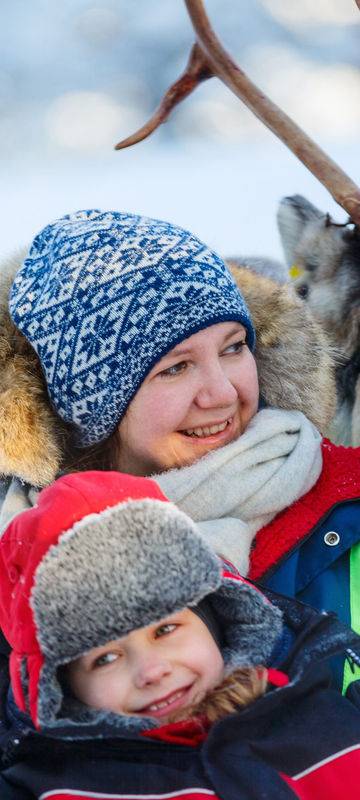 swedish lapland happy reindeer family safari ride adstk