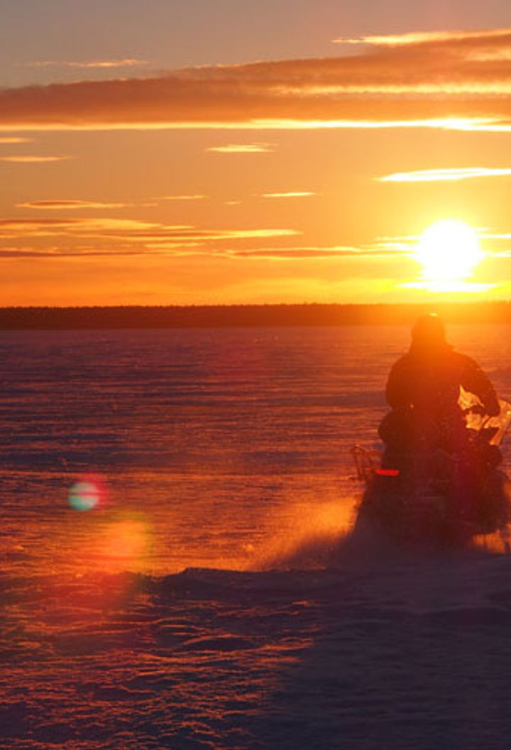 swedish lapland snowmobile tour to the lulea archipelago sunset