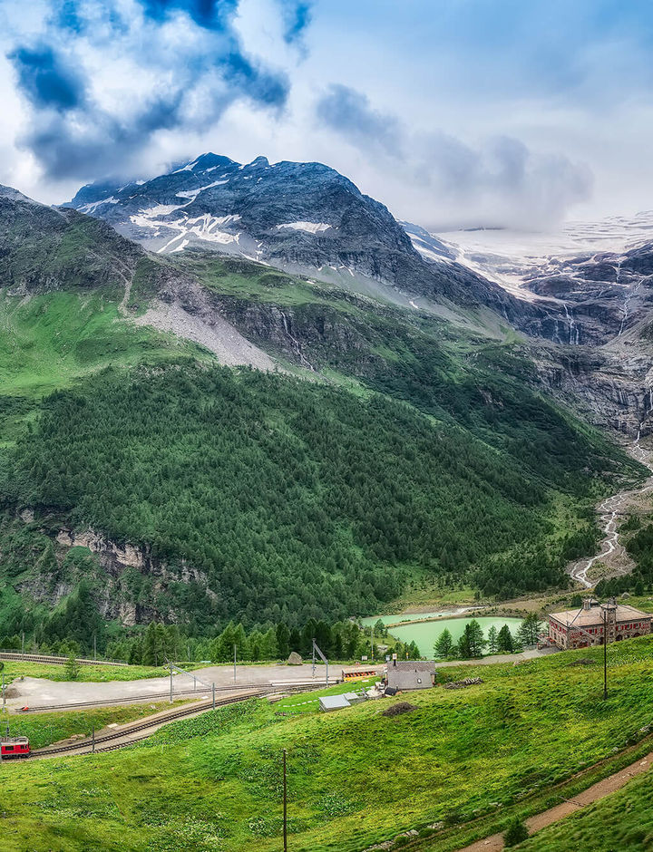 switzerland bernina express winding through valley istk