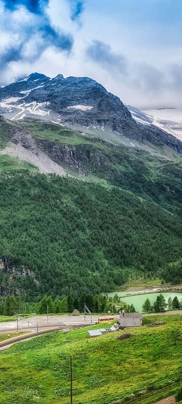 switzerland bernina express winding through valley istk