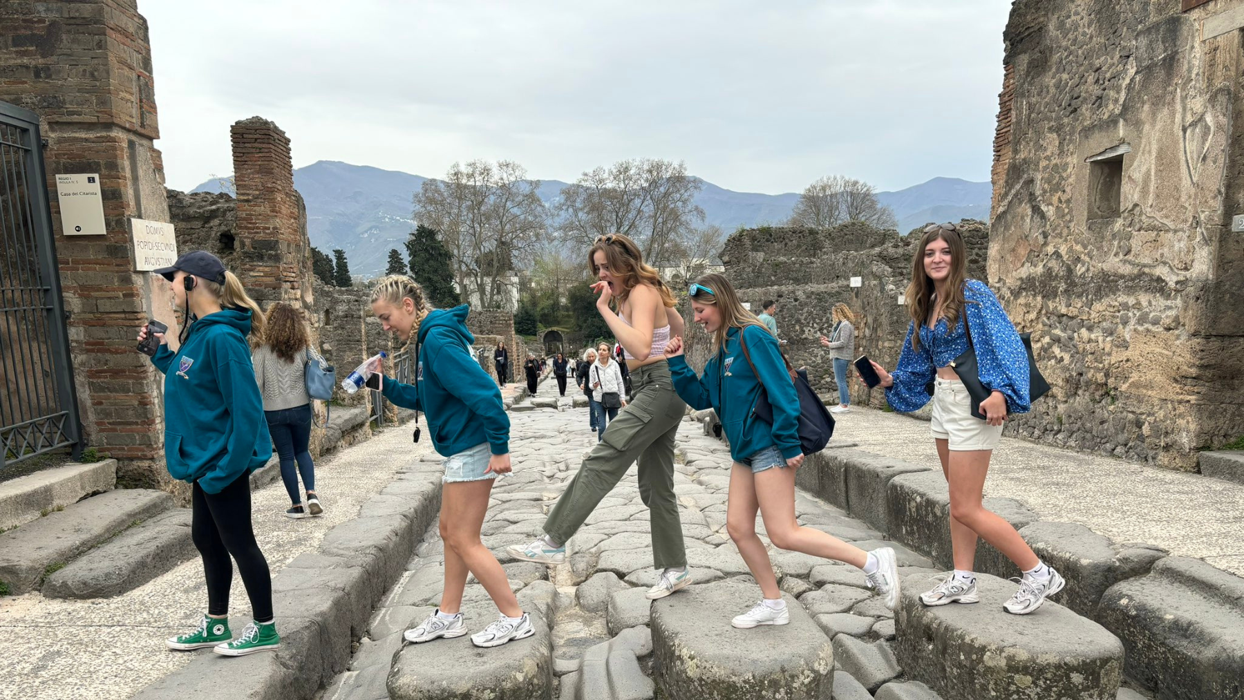 Picture of students walking across stones at Pompeii Iceland